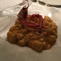 Картофельные ньокки со скампи и помидорами